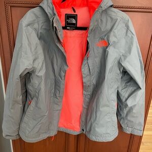 The North Face Women’s Gray Raincoat with Bright Orange Interior